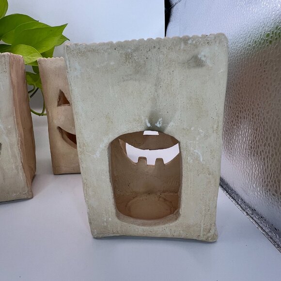 Some marks on latern, regular wear)This vintage 80s signed  Signed Ron Allen Handmade Ceramic Jack O Lantern Luminary Set